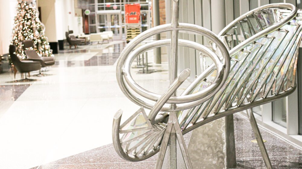 Metal sculpture installation in hospital